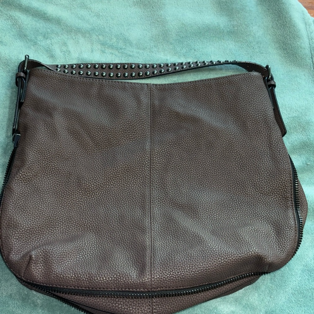 Black Rivet XL shoulder bag. Dark Mauve dark pewter accents. EUC